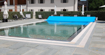 Multi-layer foam isothermal covers for public pools